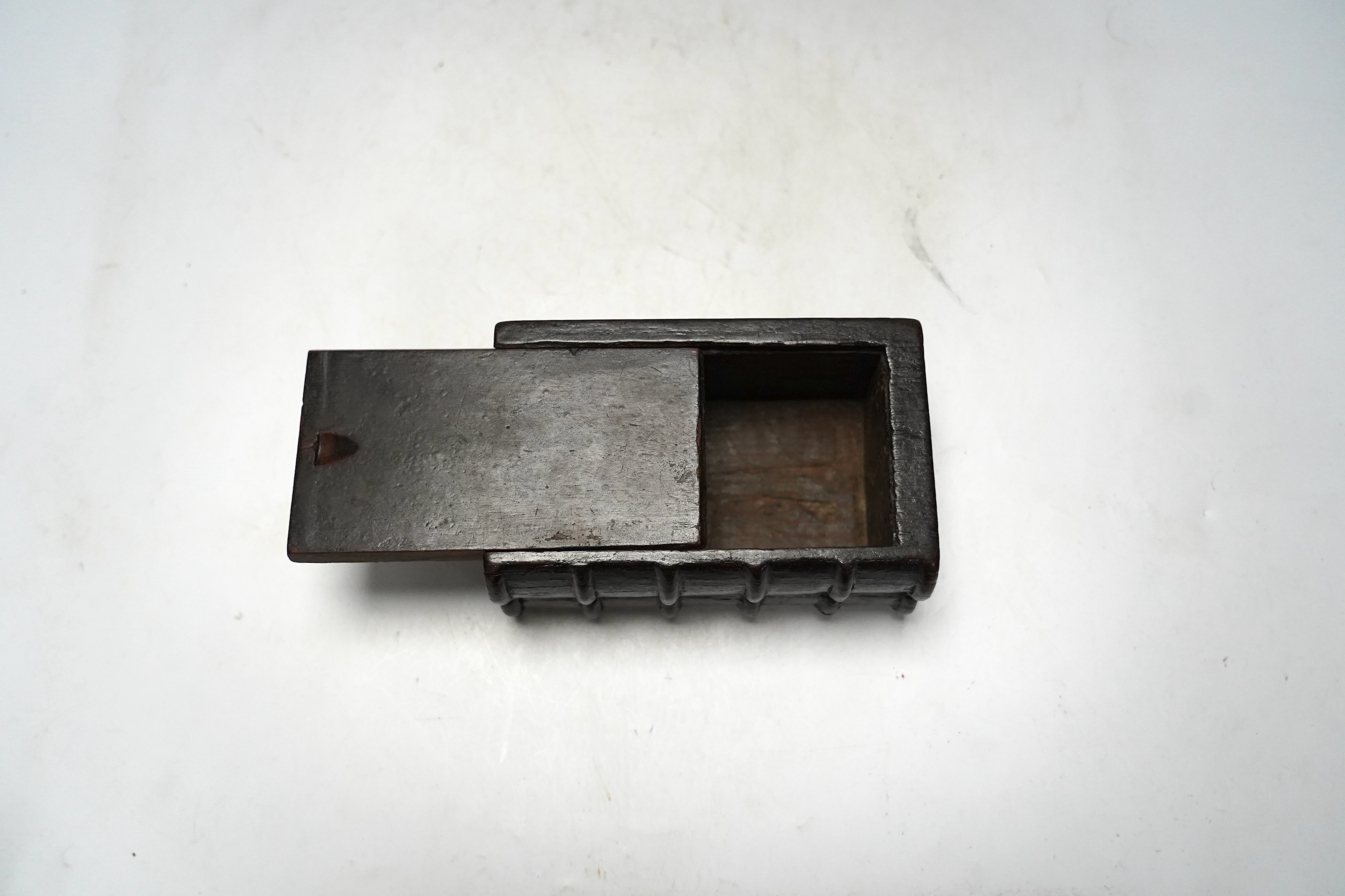 A 19th century novelty treen coin box in the form of two antiquarian books, 15.5cm